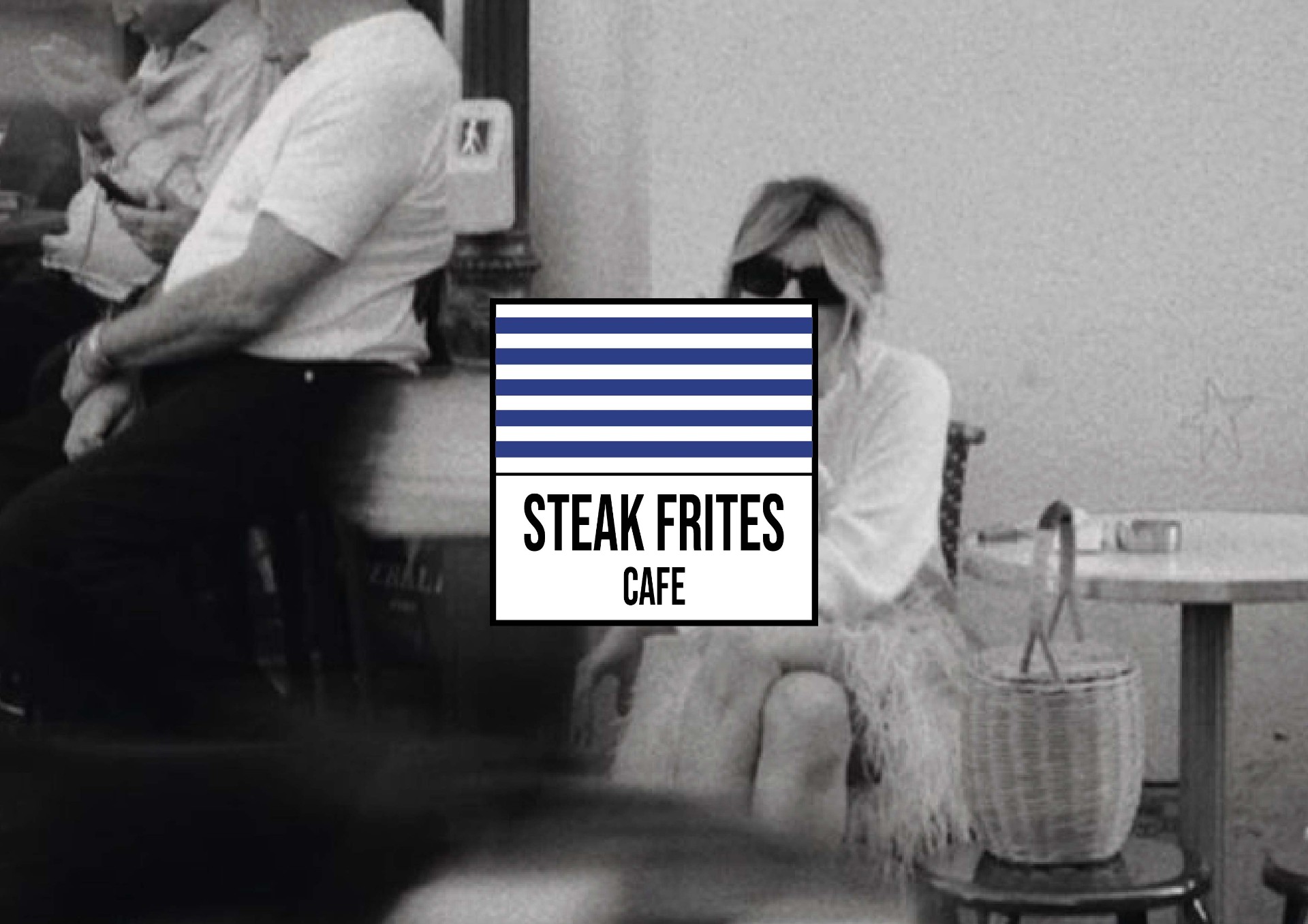 Steak Frites Cafe — Parisian bistro interior with brand mark